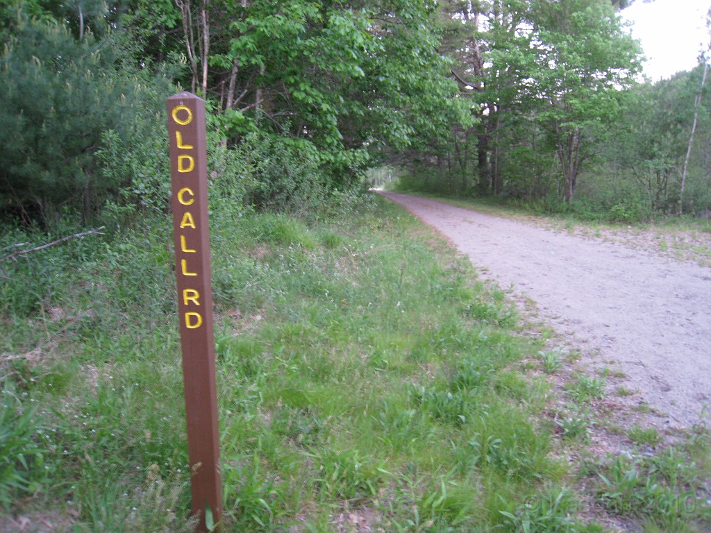 Old Hill Village - South End 495.jpg - In February 1937, residents of Hill Village NH learned that their village, near the Pemigewasset River, was to become a flood control reservoir for the Franklin Falls dam project. To accommodate the construction of the Franklin Falls Dam, the village of Hill NH was to be relocated. By January of 1940, the citizens of Hill NH formed an association, purchased land, and began planning a new model village with the help of the NH State Planning and Development Commission. Construction started in 1940, and by June of 1941 the new town hall and school were completed, along with the streets, water system, and 30 houses. The 1941 town meeting was called to order in the old town hall, recessed, and reconvened in the new village.